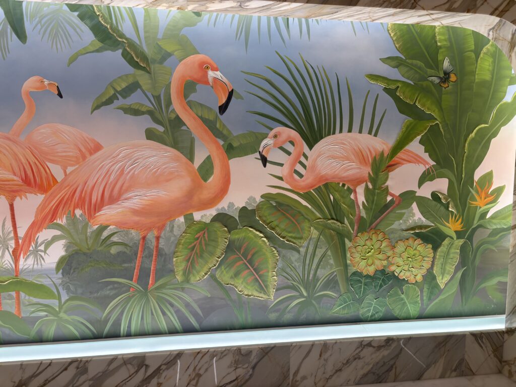 Flamingo-print wallpaper wall near the front desk at Flamingo Las Vegas
