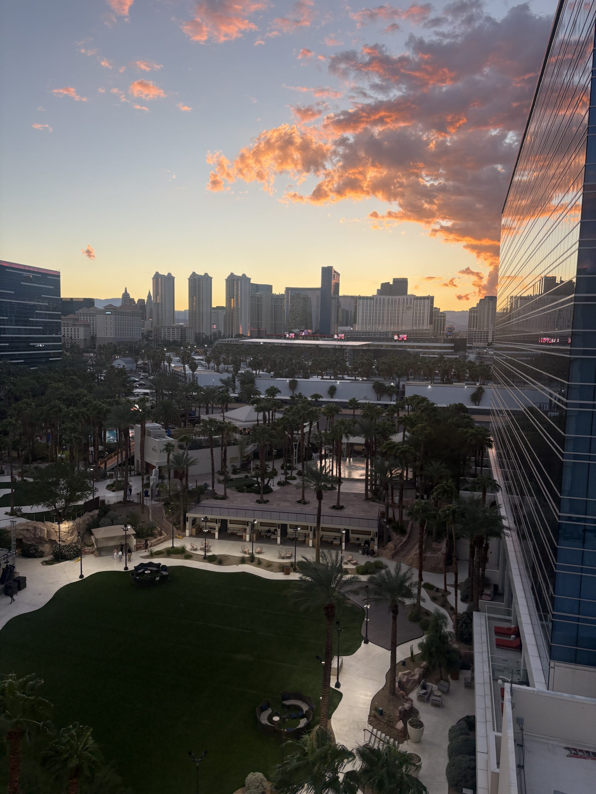 Sunset over the Las Vegas Strip skyline seen from a Virgin Hotels Canyon Tower room
