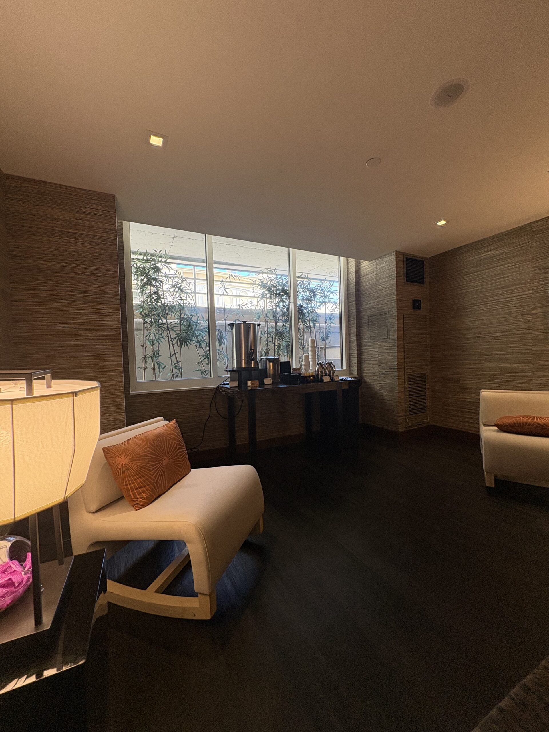 Coffee urn, cups, and lounge seating in the Living Room at Nobu Hotel, where the complimentary morning coffee and tea are served