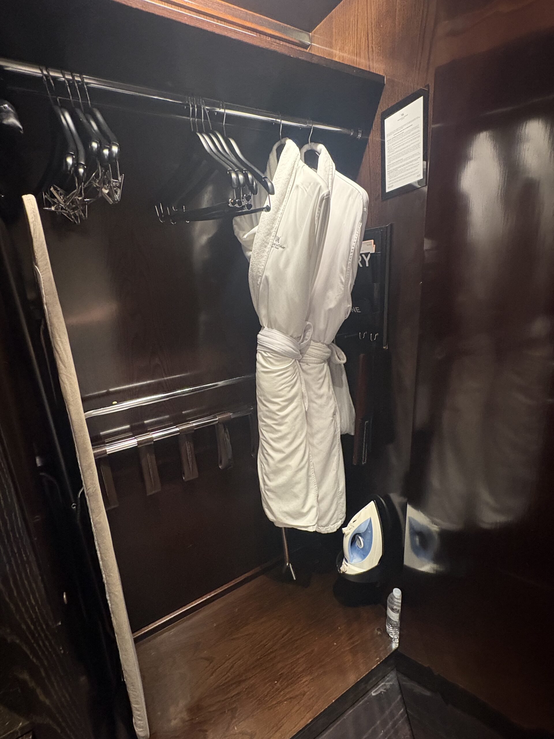 Closet with plush robes and iron at Waldorf Astoria Las Vegas