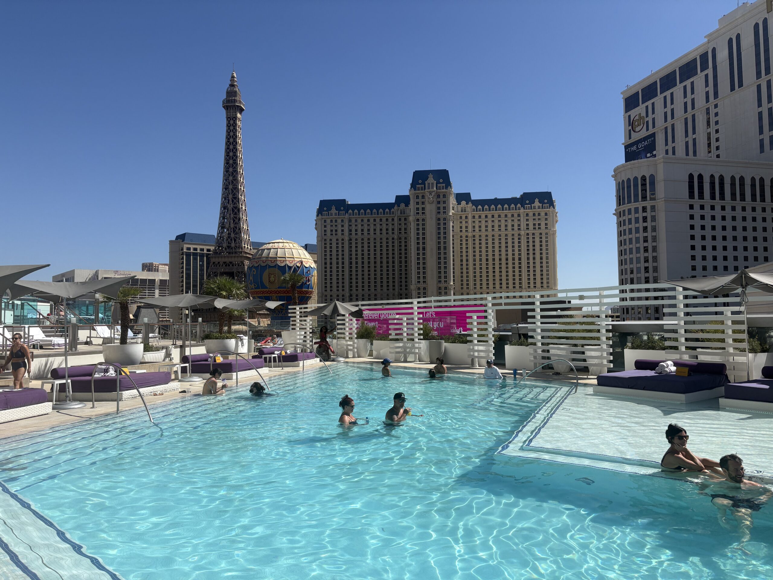 Boulevard Pool at the Cosmopolitan Las Vegas overlooking the Strip, with the Paris Eiffel Tower in view